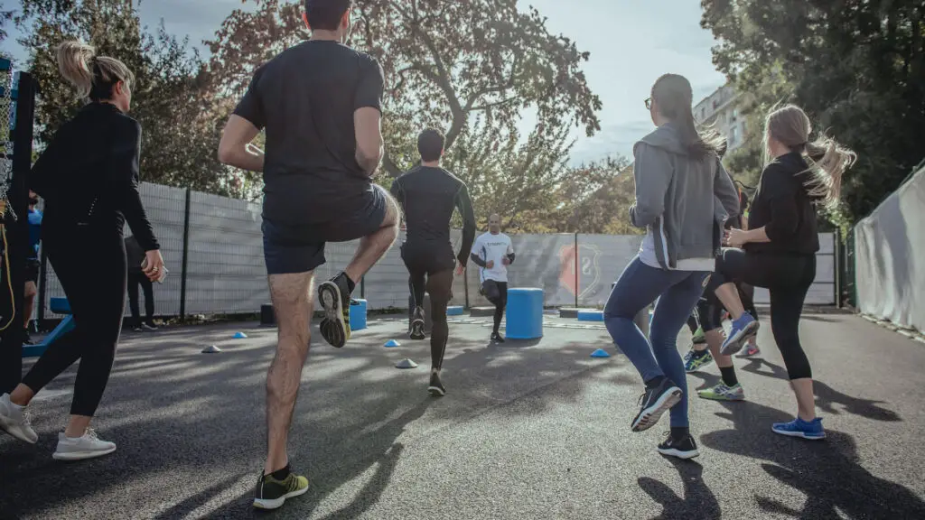 A group of people engaging in physical activity outdoors
