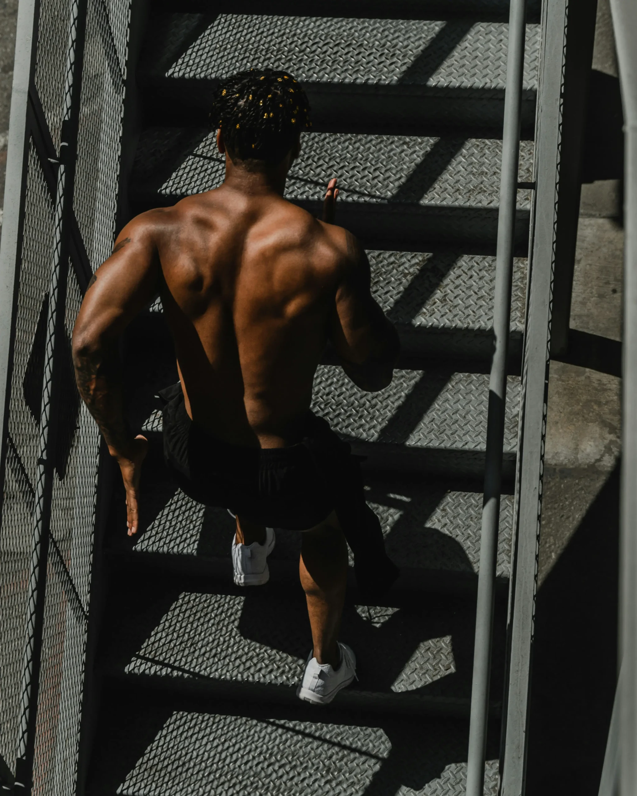 Athlete climbing Stairs
